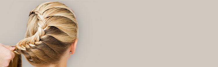 Back view of a woman's braided hairstyle