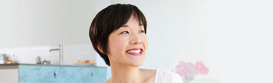 Smiling Asian woman with a short hairstyle