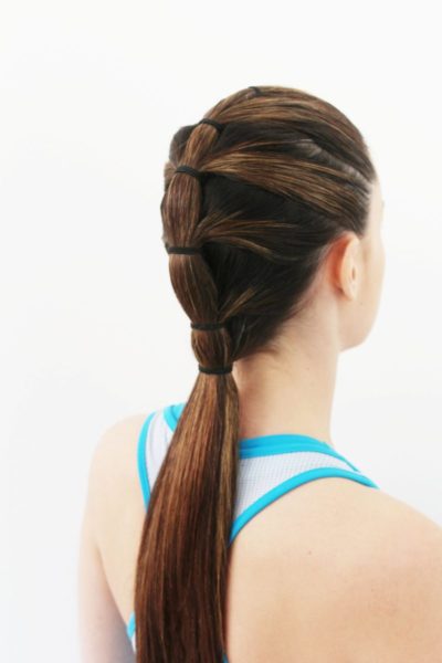 long-tiered-ponytail-brunette-woman-back-workout-best-gym-hairstyles-toppik-blog