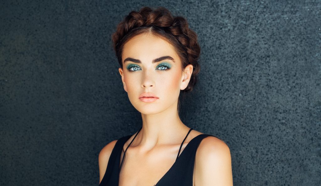 woman glamorous makeup brown hair milkmaid braids do braids help hair growth toppik hair blog