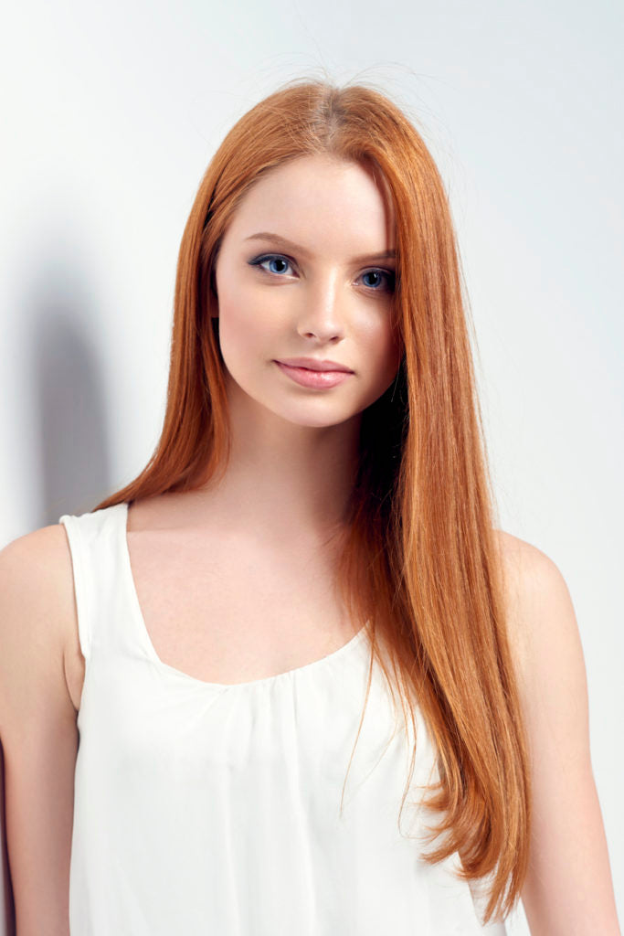 redhead long straight hair oval face best hairstyles face shape Toppik blog