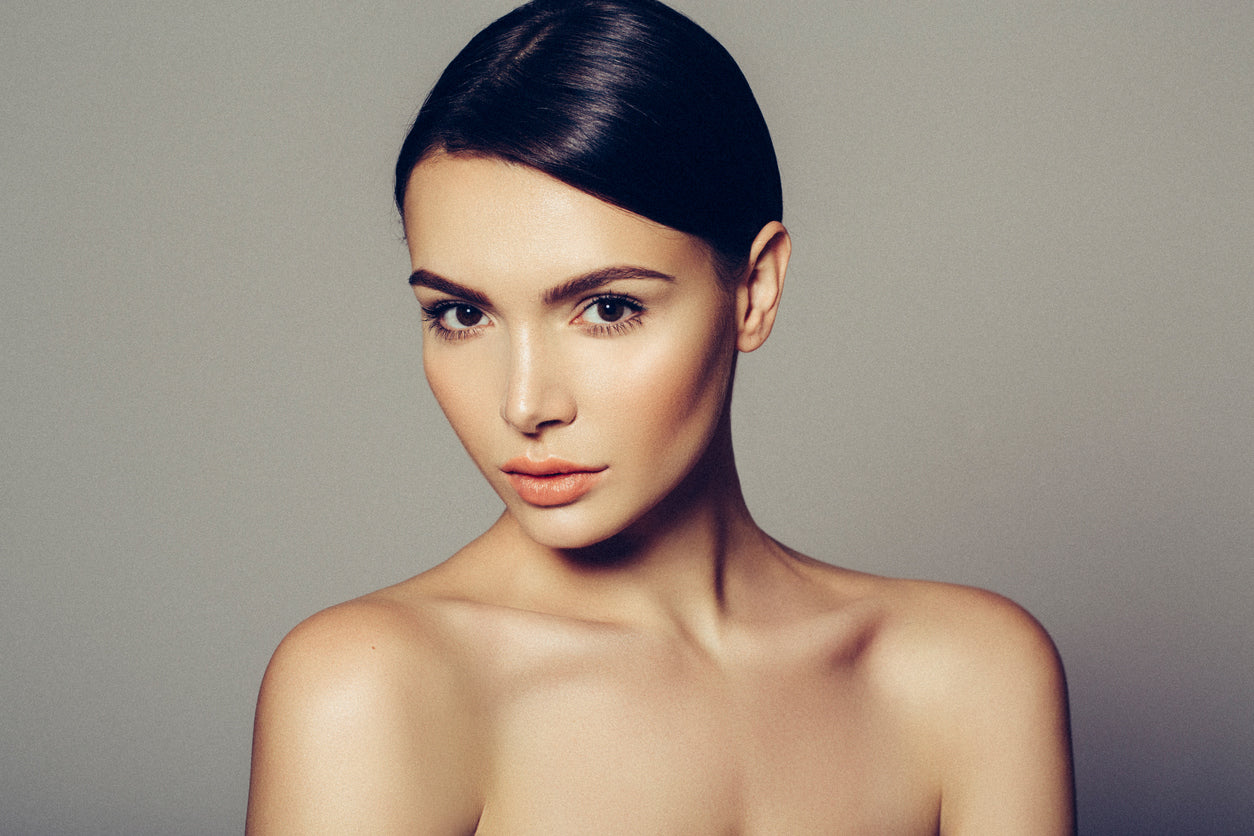 Woman with slick back hairstyle