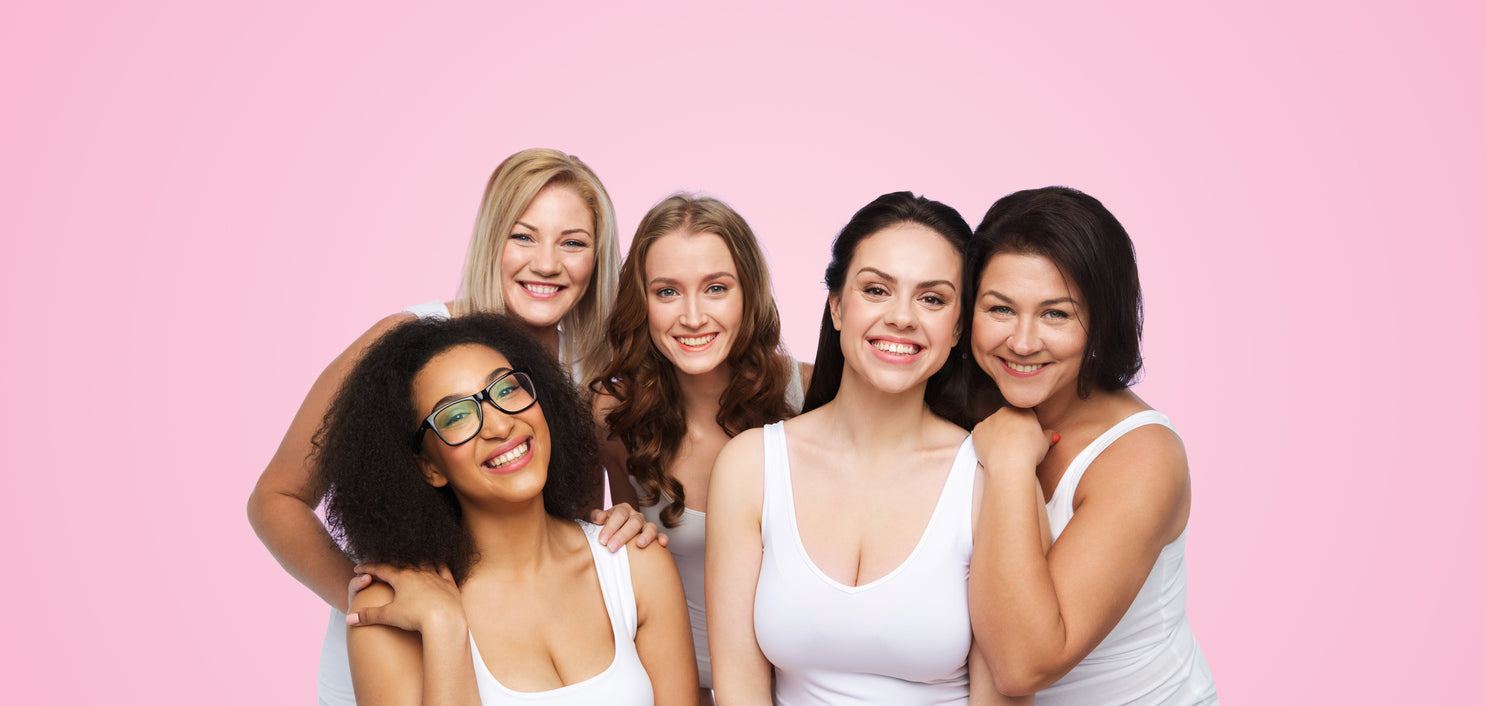 Five womens smiling with all different hairstyle