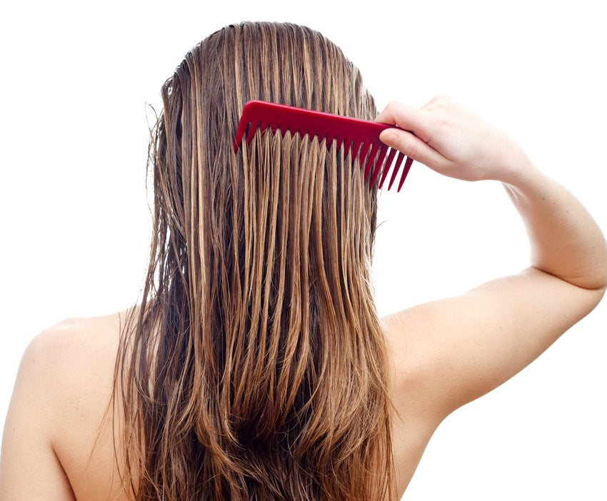 combing long wet hair back woman best hair styling tools for thin hair toppik hair blog