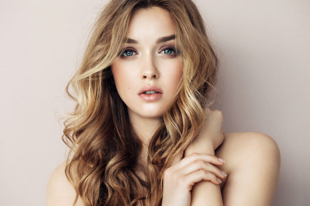long hair curly woman round face hairstyles face shapes toppik blog