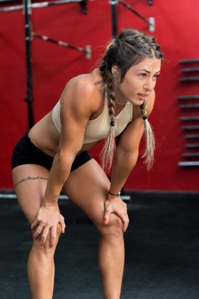 French-braids-athletic-woman-workout-long-hair-best-gym-hairstyles-toppik-blog