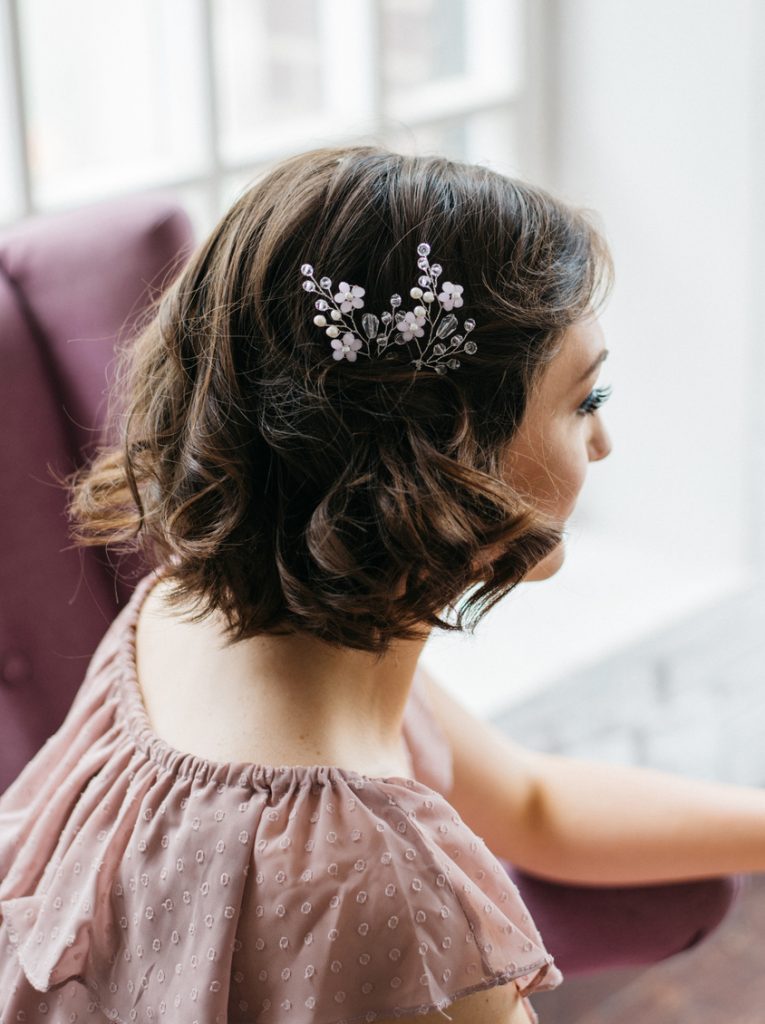 brunette floral hair accessory short hair half back lob our favorite wavy hairstyles toppik hair blog