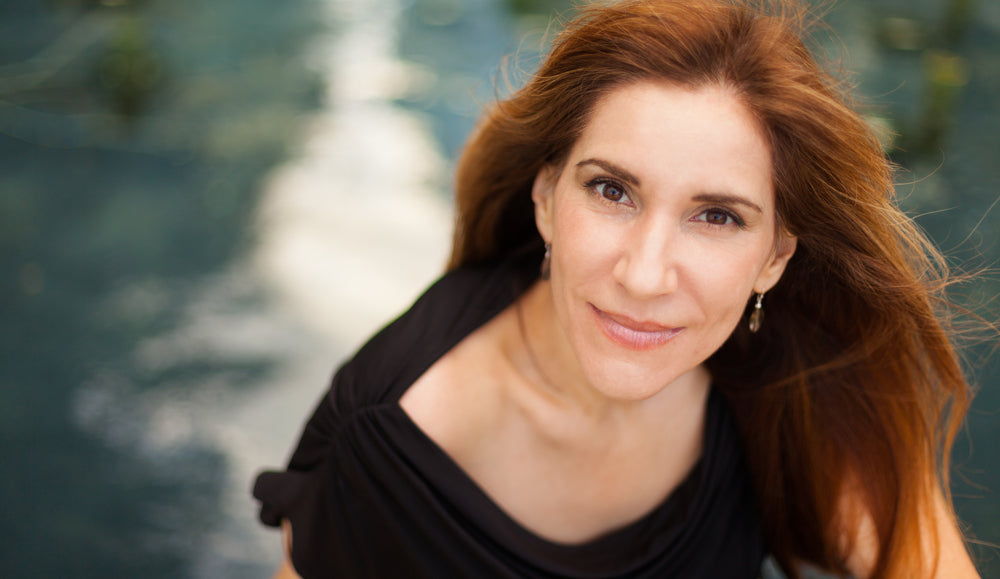 warm auburn hair woman choosing best hair colors for older women toppik hair blog