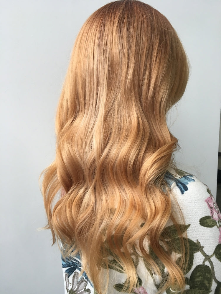 strawberry blonde hair long curly side view understanding the anatomy of hair toppik hair blog