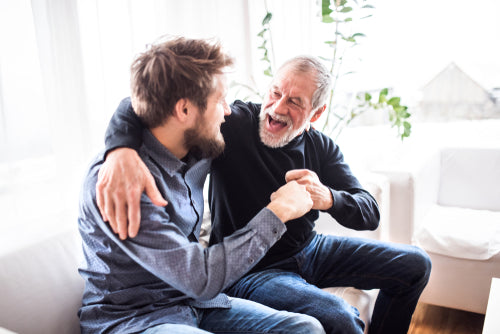 Two men with beards greeting each other Toppik hair blog