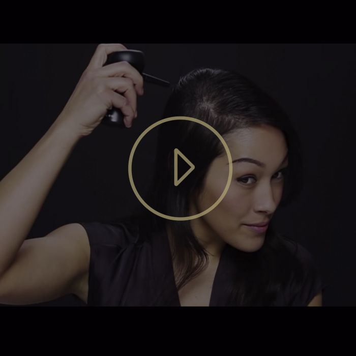 woman using Toppik hair building fiber video thumbnail