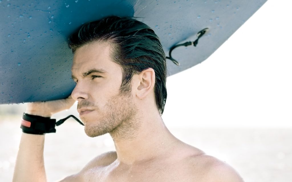 surfer man slicked back hair choosing maintaining widows peak hairstyles toppik hair blog