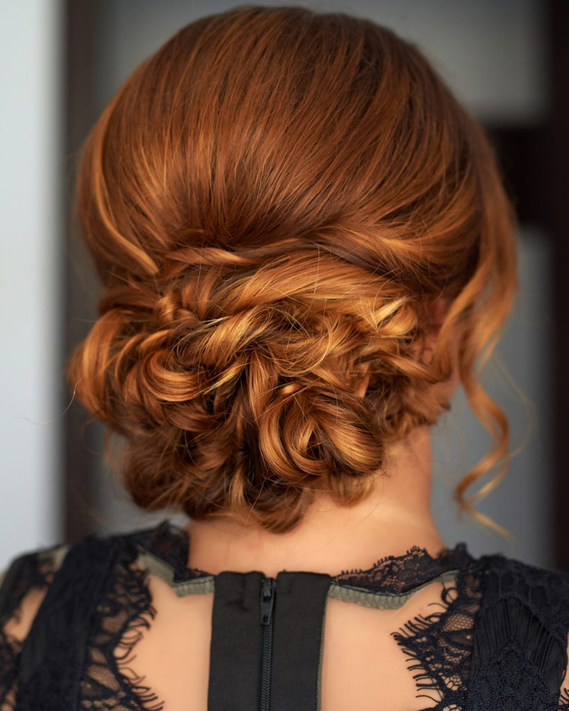 rear view red hair low romantic chignon hairstyle updo shoulder length hair styles for fine hair toppik hair blog