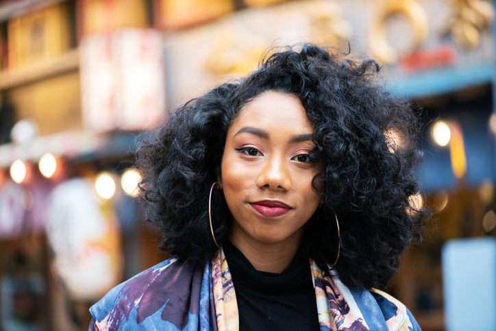 asymmetrical curly bob